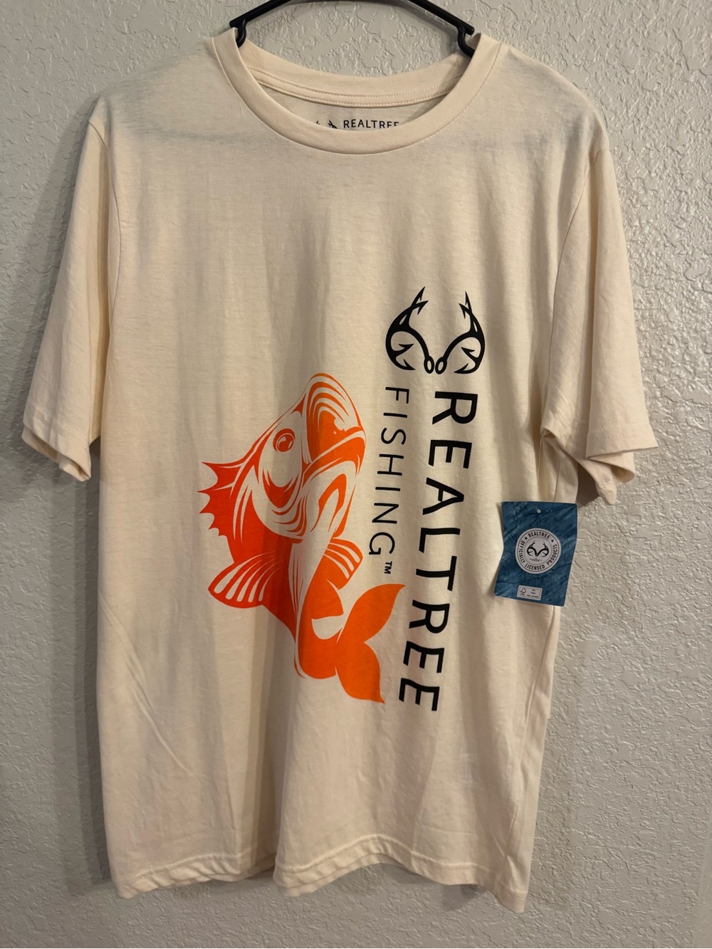 Realtree Men’s Cream T-Shirt with Bright Orange Fish Graphic